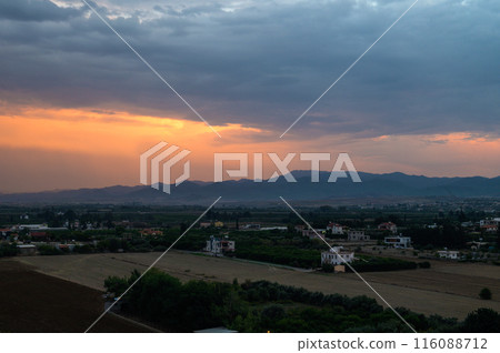 Beautiful Panoramic View of colorful cloudscape with blue Sky in Background during a sunny winter sunset. 116088712