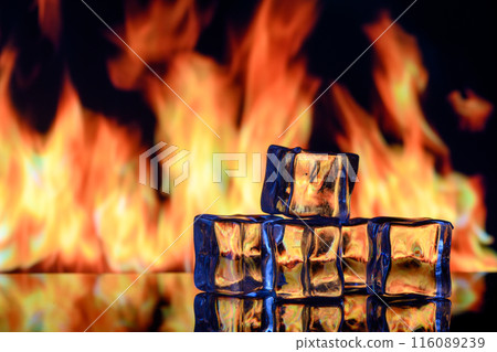 Burning ice cubes on black background 116089239