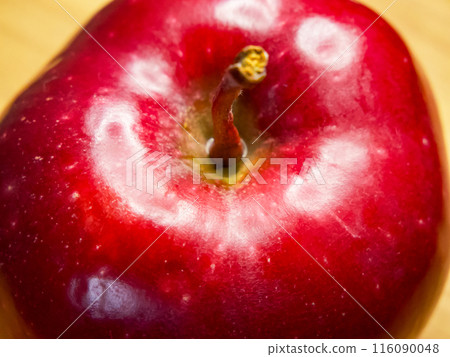 Juicy Apple Freshness. A juicy red apple with visible water droplets. Juicy Apple Freshness. A juicy red apple with visible water droplets. 116090048