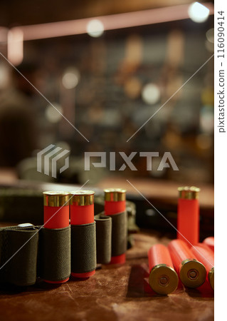 Bullets cartridge and belt chain for storage in weapon shop 116090414