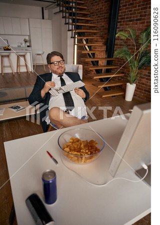 Lazy relaxed funny businessman working online comfortably high angle view 116090628