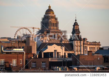 Brussels Old Town, Belgium - High angle view over the historical city center with the dome of the Court House during golden hour 116091453