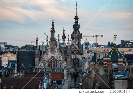 Brussels Old Town, Belgium - High angle view over the historical city center and the Saint Nicholas church during the golden hour Brussels Old Town, Belgium - High angle view over the historical city center and the Saint Nicholas church during the golden hour 116091454