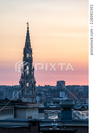 Brussels Old Town, Belgium - Golden hour cityscape with the town hall tower and rooftops 116091501