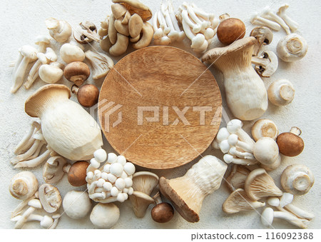 Assortment of various raw mushrooms 116092388