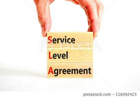 SLA service level agreement symbol. Concept words SLA service level agreement on beautiful wooden blocks. Beautiful white background. Business SLA service level agreement concept. Copy space. SLA service level agreement symbol. Concept words SLA service level agreement on beautiful wooden blocks. Beautiful white background. Business SLA service level agreement concept. Copy space. 116092423