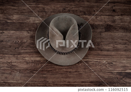 Old west hat on table. 116092515
