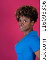Woman in Blue Shirt Posing 116093306