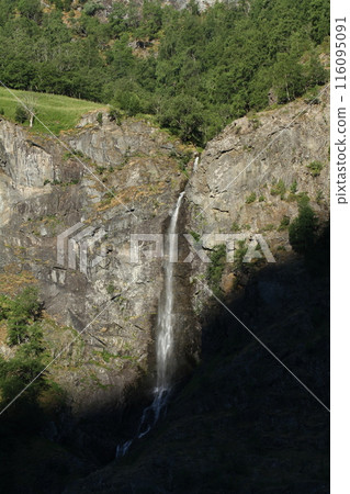 Waterfall in the valley of the Naeroyfjord 116095091