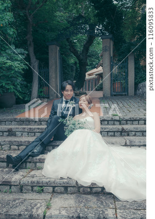 Bride and groom in tuxedo and wedding dress Bride and groom in tuxedo and wedding dress 116095833