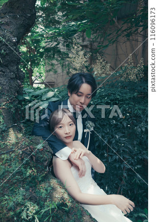 Bride and groom in tuxedo and wedding dress Bride and groom in tuxedo and wedding dress 116096173