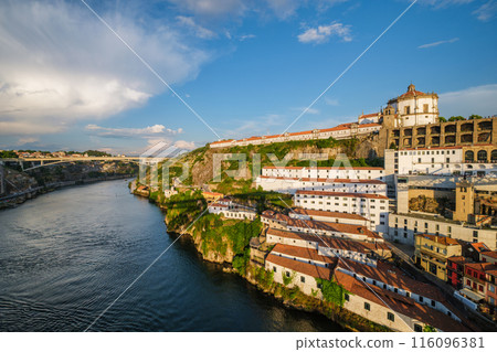 View of Vila Nova de Gaia city, Porto, Portugal, on sunset View of Vila Nova de Gaia city, Porto, Portugal, on sunset 116096381