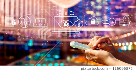 Data Privacy concept with person using a smartphone in city at night Data Privacy concept with person using a smartphone in city at night 116096875