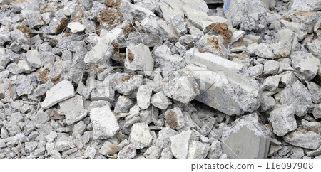 Piles of rubble after house demolition 116097908
