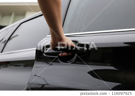 Male hand opening car door Male hand opening car door 116097925