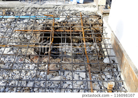 Reinforcement before pouring concrete with foundation pile, concrete floor 116098107