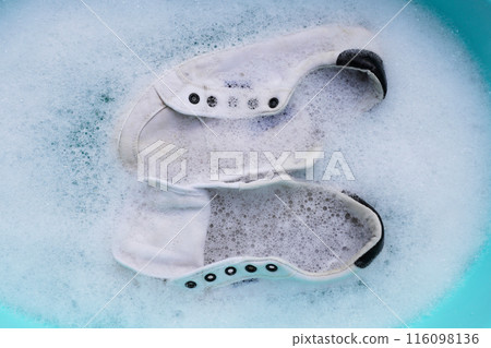 Soak shoes before washing. Cleaning Dirty sneakers. 116098136