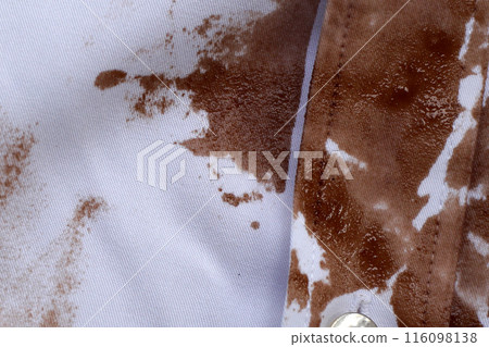 Dirty choclate stain on white shirt 116098138