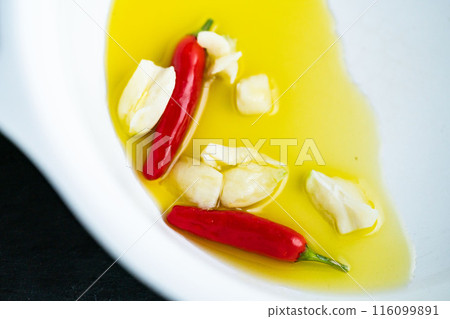 Cooking Basics: Chili Peppers and Garlic - Transferring the Fragrance to Olive Oil - Before Heating 116099891