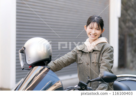  Woman riding a bike 116100403