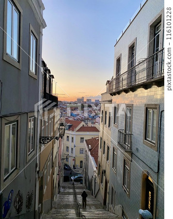 Sunset seen from the alley at the top of the hill Sunset seen from the alley at the top of the hill 116101228