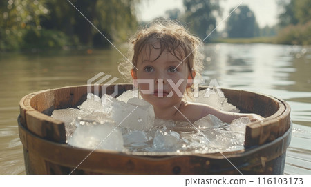 Child in Refreshing Ice Bath by the River 116103173