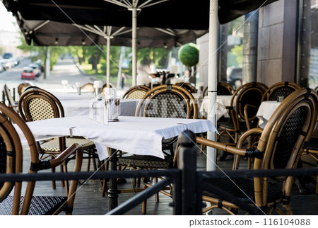 Empty cafe with terrace with tables and chairs. 116104088