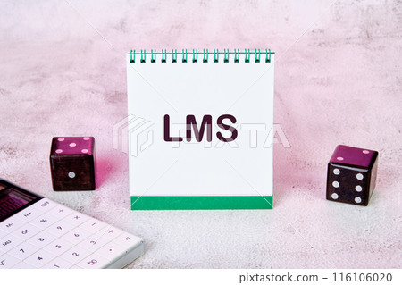 LMS - Learning Management System acronym. LMS on a notepad on the table next to a calculator and playing dice LMS - Learning Management System acronym. LMS on a notepad on the table next to a calculator and playing dice 116106020