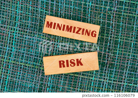 MINIMIZING RISK text on wooden blocks, conceptual photo MINIMIZING RISK text on wooden blocks, conceptual photo 116106079