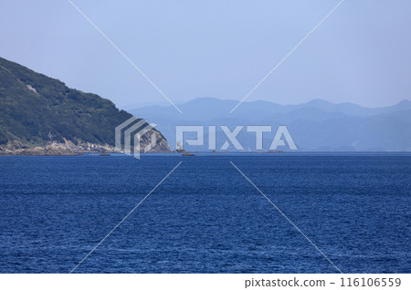 A distant view of the Sada Misaki Peninsula's Kokajitanihana, Uwa Sea, and the Shikoku Mountains A distant view of the Sada Misaki Peninsula's Kokajitanihana, Uwa Sea, and the Shikoku Mountains 116106559
