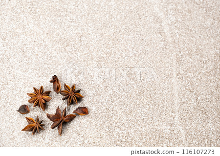 Spice star anise closeup on gray stone background, copy space for text Spice star anise closeup on gray stone background, copy space for text 116107273