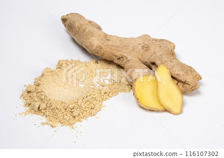 Spice ground ginger and ginger root on a white isolate background Spice ground ginger and ginger root on a white isolate background 116107302