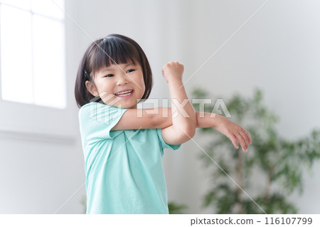 Children doing warm-up exercises at home (exercise, sports, stretching) 116107799