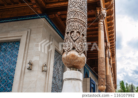carved wooden colonnade with oriental pattern Uzbek ornament in Museum of Victims of Political Repression in Tashkent carved wooden colonnade with oriental pattern Uzbek ornament in Museum of Victims of Political Repression in Tashkent 116107992
