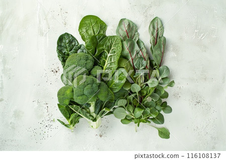 Fresh Green Vegetables Assortment on Textured Background 116108137