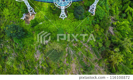 Aerial view of the Pra Yai Phu Khok Ngio or Chiang Khan Skywalk, Loei Province's newest landmark, overlooking the Hueang River flowing through to meet the Mekong River. Aerial view of the Pra Yai Phu Khok Ngio or Chiang Khan Skywalk, Loei Province's newest landmark, overlooking the Hueang River flowing through to meet the Mekong River. 116108872