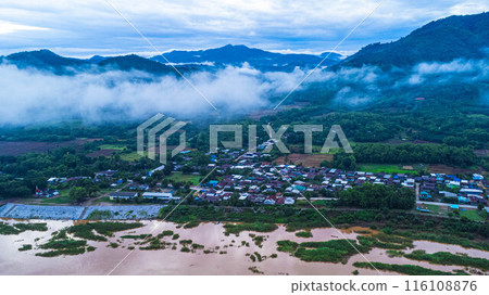 Aerial view of Chiang Khan old village landscape in the morning during the rainy season, a village along the Mekong River in Loei Province, Thailand. 116108876