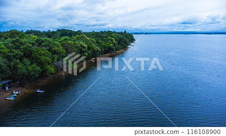 Aerial view of Kham Somboon Beach, Bueng Khong Long District, Bueng Kan Province, Thailand, showing the nature of the forest that surrounds a large body of water that is rich in nature. 116108900