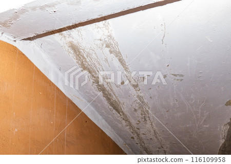Damage ceiling from water pipelines leakage. Housing problem concept 116109958