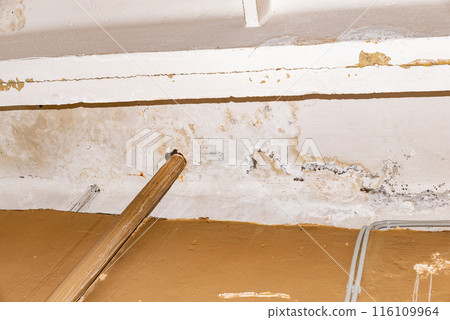 Damage ceiling from water pipelines leakage. Housing problem concept 116109964
