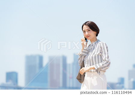 Business city woman smartphone 116110494