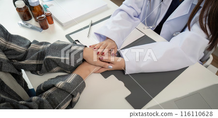 Doctor Providing Encouragement and Support to Patient During Consultation in Modern Medical Office Doctor Providing Encouragement and Support to Patient During Consultation in Modern Medical Office 116110628