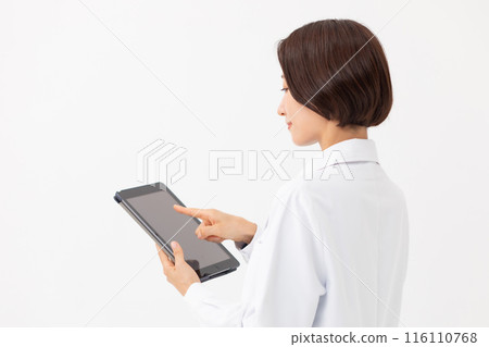 A white lady with a tablet A white lady with a tablet 116110768