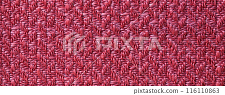 Texture of dark red background from woven textile with wicker pattern, macro. Wine vintage fabric 116110863