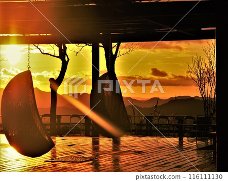A deck lit up by the sunset A deck lit up by the sunset 116111130