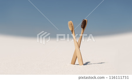 Eco-Friendly Bamboo Toothbrushes on Sandy Beach Against Blue Sky Eco-Friendly Bamboo Toothbrushes on Sandy Beach Against Blue Sky 116111731