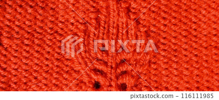 Handmade knitted fabric orange or red wool background texture Handmade knitted fabric orange or red wool background texture 116111985
