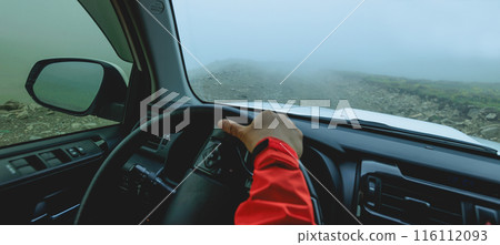 Driving car on the high altitude mountain trail in tibet,China 116112093