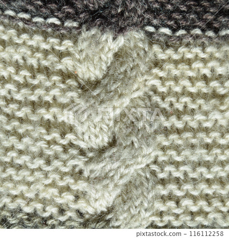Handmade knitted fabric grey and white wool background texture 116112258