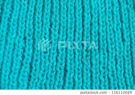 Handmade knitted fabric blue wool background texture 116112689